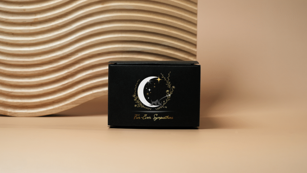 Everlasting Pet Sympathy box including 5x7 Black Double Tabletop Picture Frame 2 oz Honey Bourbon Soy Candle Handmade Crocheted Basket with Magnetic Back Live Air Fern (Air Plant) Memorial Flower Bomb (Seeded Paper Daisy) Pet Sympathy Glass Stone (Your Choice) Handwritten Sympathy Card (Your Choice) Handmade Door Knob Chime with White Feather Fur-Ever Sympathies Reflection Note Thoughtful Packaging